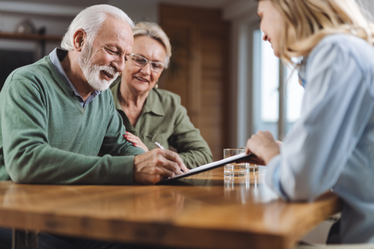 Senior couple meeting with estate planning lawyer